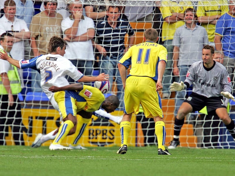 Striker Tresor Kandol bundles home a Andy Hughes cross in the dying seconds to win the game.
