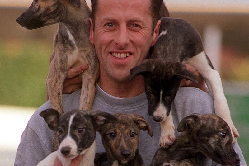 Whitehall Road car dealer Brian Wheelhouse holds five abandoned puppies which he was looking to rehome in October 1997.