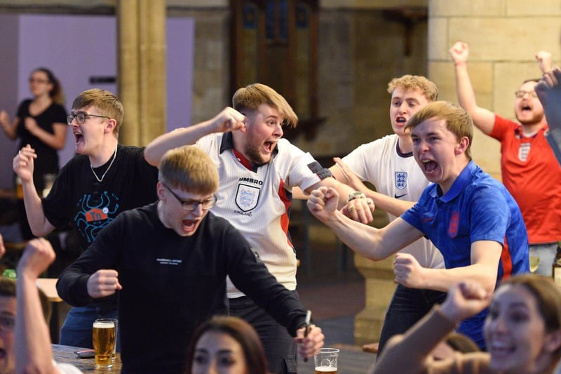 Fans celebrate England's first half equaliser