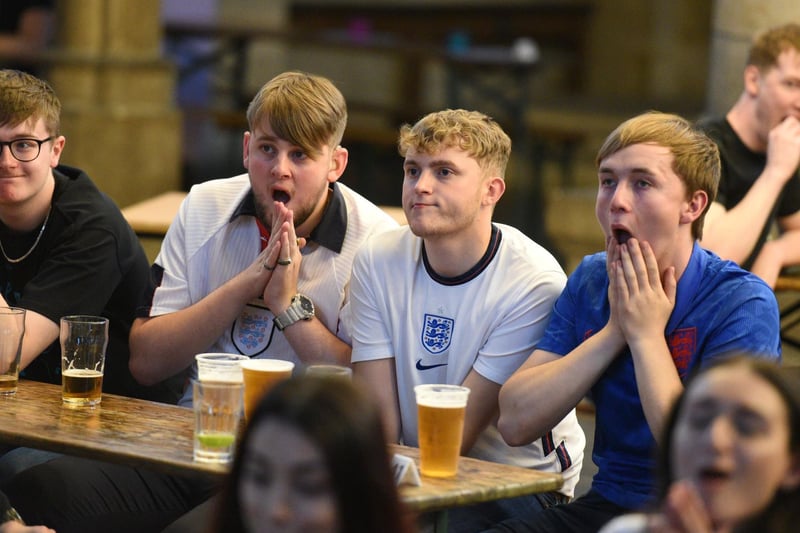 Fans watch England go 1-0 down.
