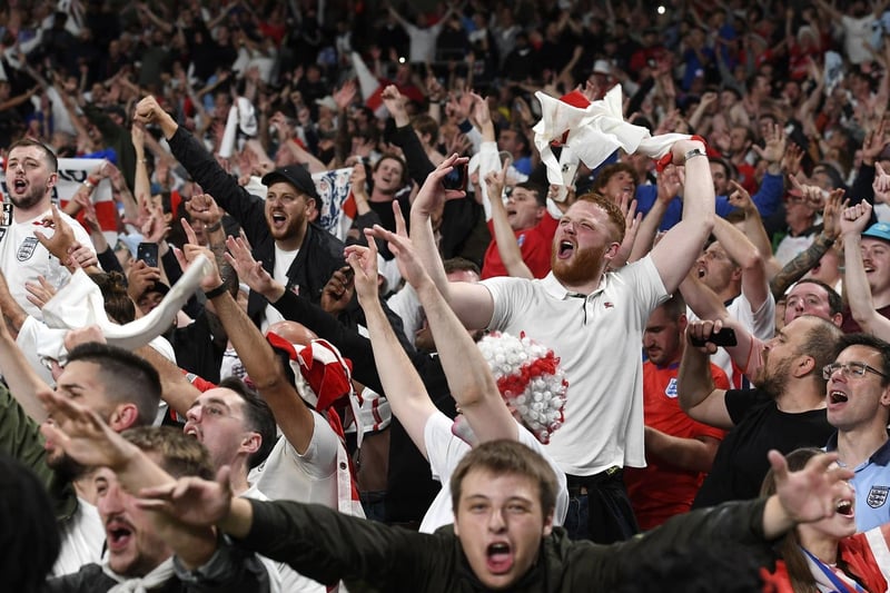 England's fans celebrate at Wembley Stadium. (Andy Rain/Pool via AP)