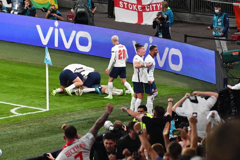 In front of the delighted England supporters at Wembley after Kane's winner. Photo by Justin Tallis - Pool/Getty Images.