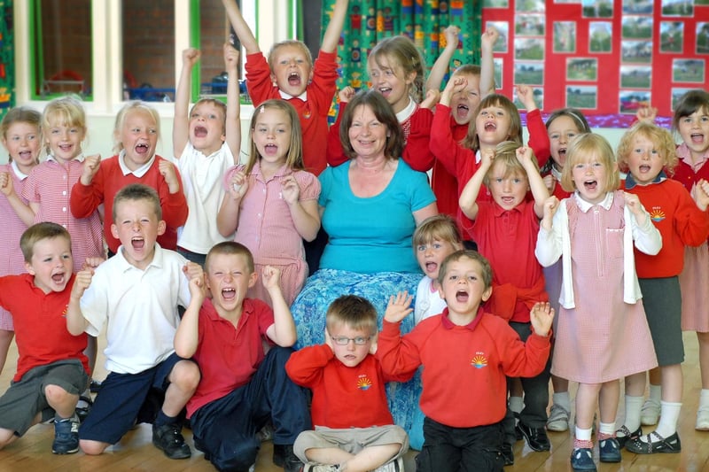 Filey Infants School deputy head Susan White retires. She is cheered on by pupils.