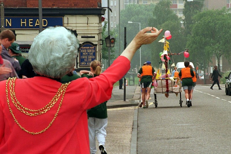 The Lord Mayor of Leeds, Coun Linda Middleton, waves off the final fundraising bed push in aid of St James's Hospital. The effort was raising money for haematology unit, Ward 33.