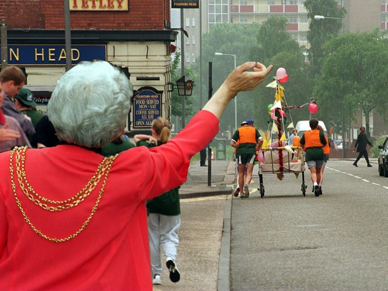The Lord Mayor of Leeds, Coun Linda Middleton, waves off the final fundraising bed push in aid of St James's Hospital. The effort was raising money for haematology unit, Ward 33.