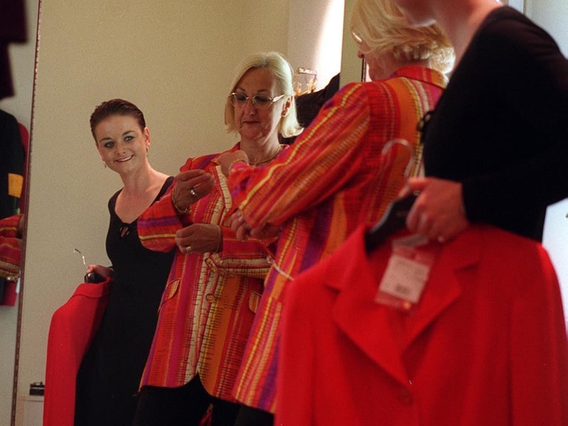 Harvey Nichols' personal shopper Jill McManaman, right, chooses a jacket for Dorothy Shipley, in the Leeds store.