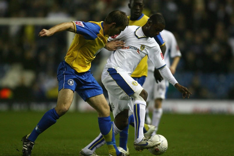 Tresor Kandol holds off a challenge from Hereford United's John McCombe during the FA Cup first round replay at Elland Road in November 2007.