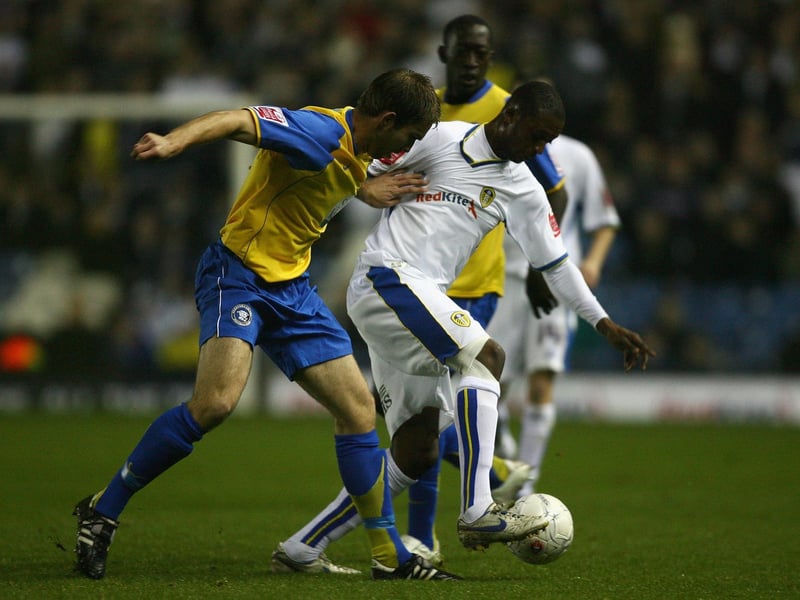 Tresor Kandol holds off a challenge from Hereford United's John McCombe during the FA Cup first round replay at Elland Road in November 2007.