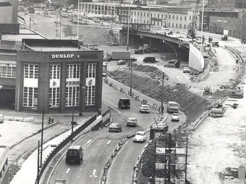 The third stage of the Inner Ring Road opened on November 7, 1974. The first person onto the flyover was Terence Muddiman and traffic warden Charles Wheatley directed the first cars across.