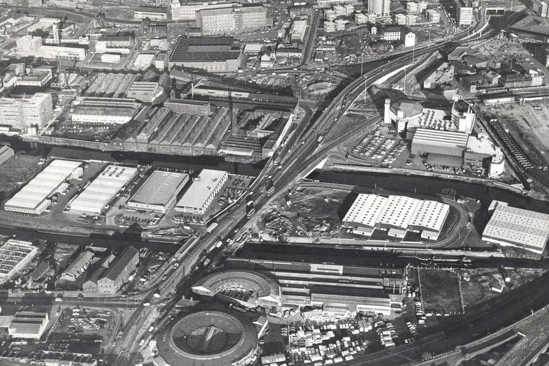 The western end starting from the bottom left near the old railway roundhouse, crossing the canal and the River Aire to the centre of this photo where the Wellington Street and Kirkstall flyover is nearing completion.