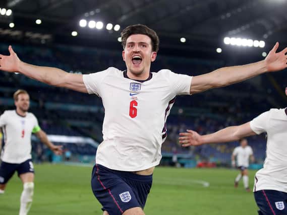 Harry Maguire celebrates scoring their side's second goal of the game during the UEFA Euro 2020 Quarter Final match at the Stadio Olimpico, Rome