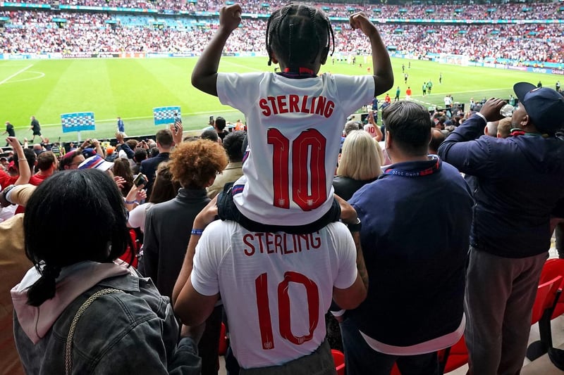 England's Raheem Sterling son Thiago celebrates with family after the final whistle during the UEFA Euro 2020 round of 16 match at Wembley Stadium