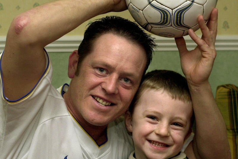 This is Bramley's Paul Asquith who was celebrating after winning £10,000 in a half time competition during Leeds United's clash with Tottenham Hotspur at Elland Road. He is pictured with son Jack.