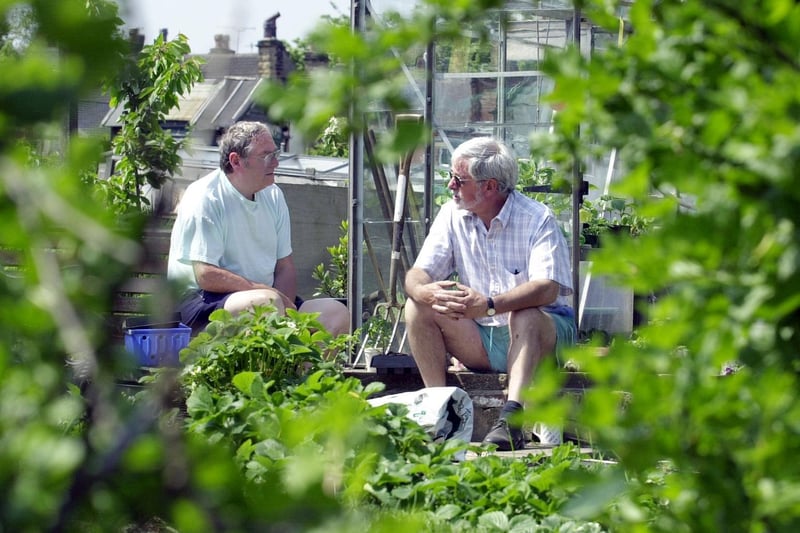Plot holders Ronnie Garbutt and Ron Short enjoy the sunshine at Haleys Field Allotments in Bramley.