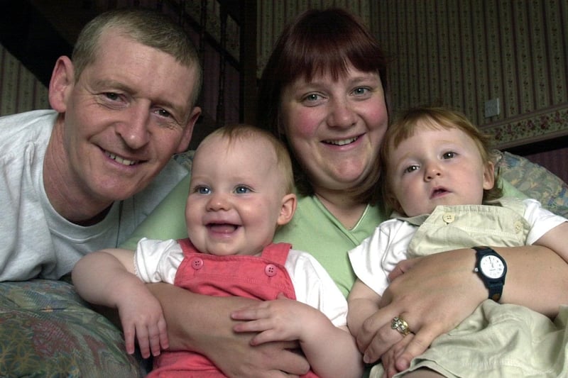 John and Lynne Wilson with IVF twins Molly (left) and Maisie at their home at Bramley in May 2001.