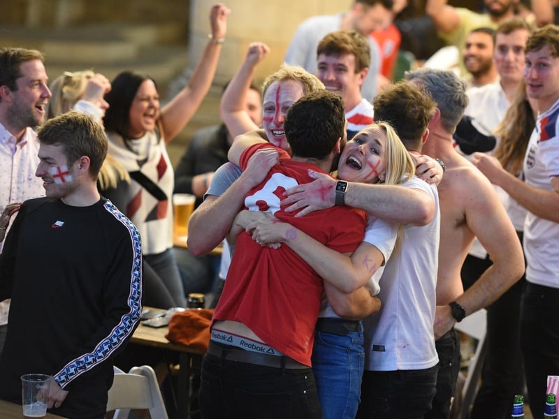 England fans watching the game on a big screen at Left Bank Leeds cheer as Luke Shaw opens the scoring.
Picture: Guzelian.