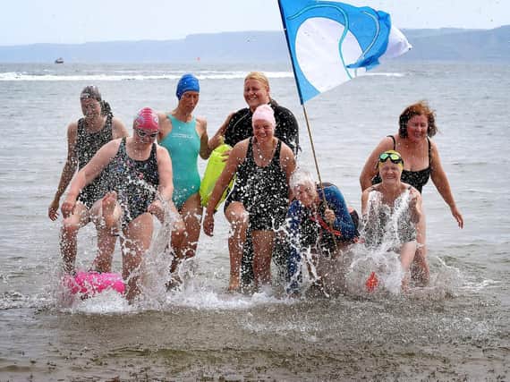 Scarborough Belle rally and big swim for Covid heroes started at Vincent Pier and finished in the sea. Picture: JPI Media/ Richard Ponter
