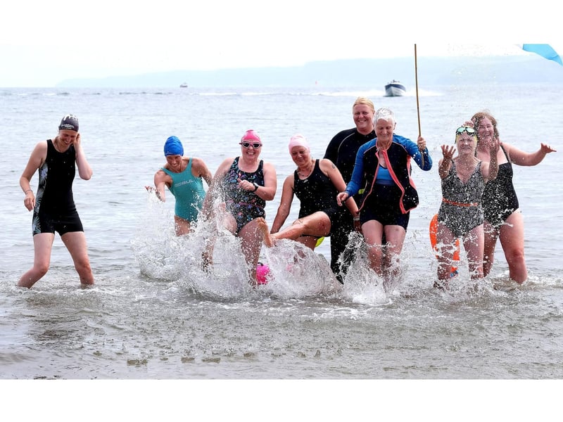 Braving the cold water.