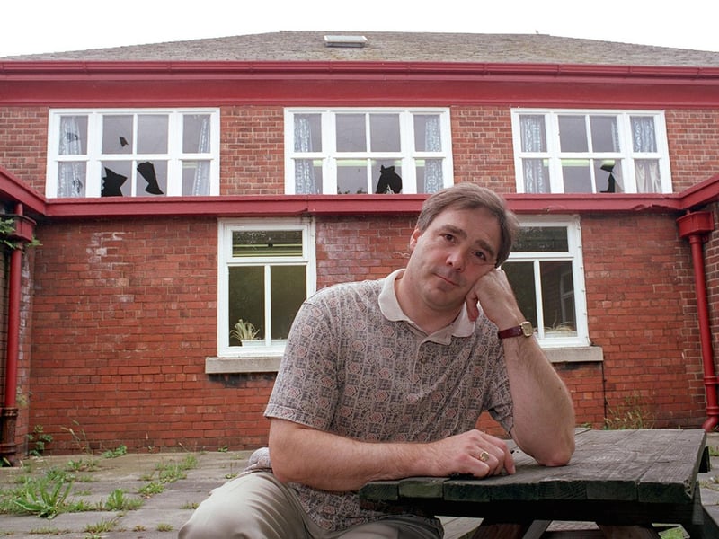 Stephen Watkins, headteacher of Potternewton Primary, looks over the damage caused by vandals who broke more than 30 windows.