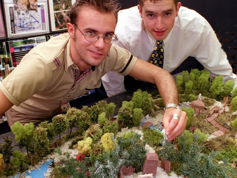 Leeds Metropolitan University graduates Steve Heywood, left, and Adrian Parr with a model of a fantasy adventure trail they designed for Martin House Hospice.