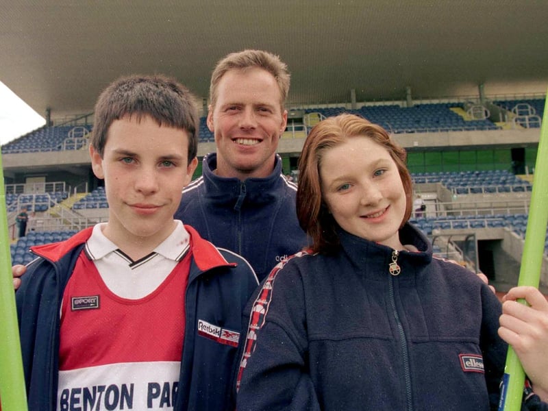 Olympic javelin thrower Mick Hill pictured with the winners of a schools coaching session at South Leeds Stadium. Pictured is Andrew Robinson and Francine Shilton.
