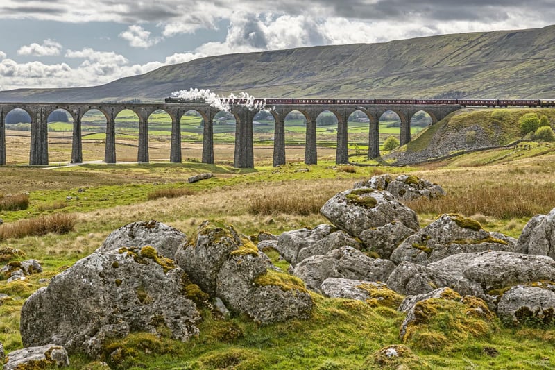 The British India Line loco crosses the Ribblehead Viaduct heading towards Settle from Carlisle