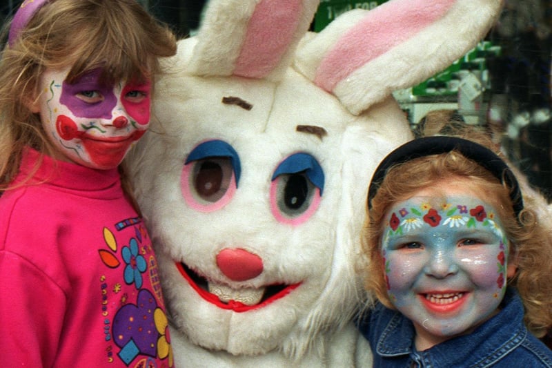 Dewsbury Easter Fun Day was held in April 1997. Leanne Ockenden and sister Toni had their faces painted. They are pictured with Easter bunny, Amanda Sheldon, manageress at Dewsbiry's Famous Army Stores.
