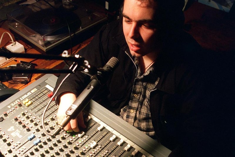Robert Ward tests the sounds of the new Christian radio station at Dewsbury Gospel Church in March 1997.