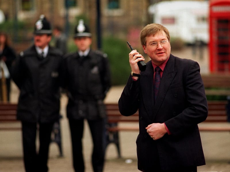 January 1997 and Victor Gill, store manager of Safeways, tests out the new Shopwatch scheme in Dewsbury town centre.