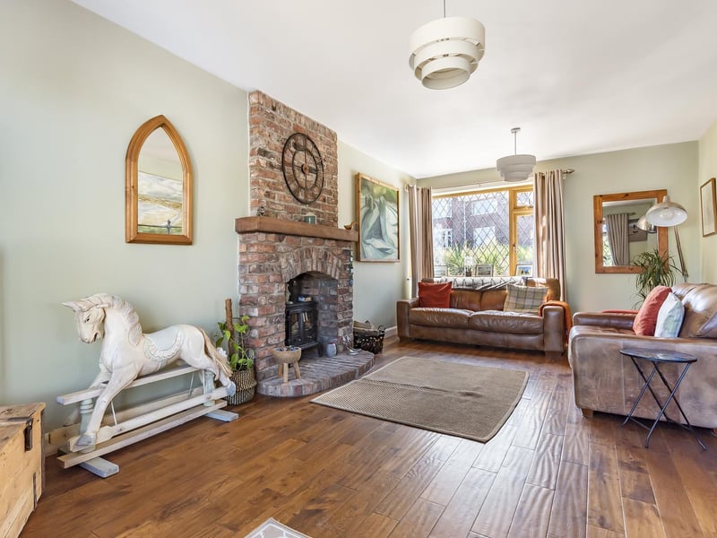 A large fireplace is a feature within the lounge
