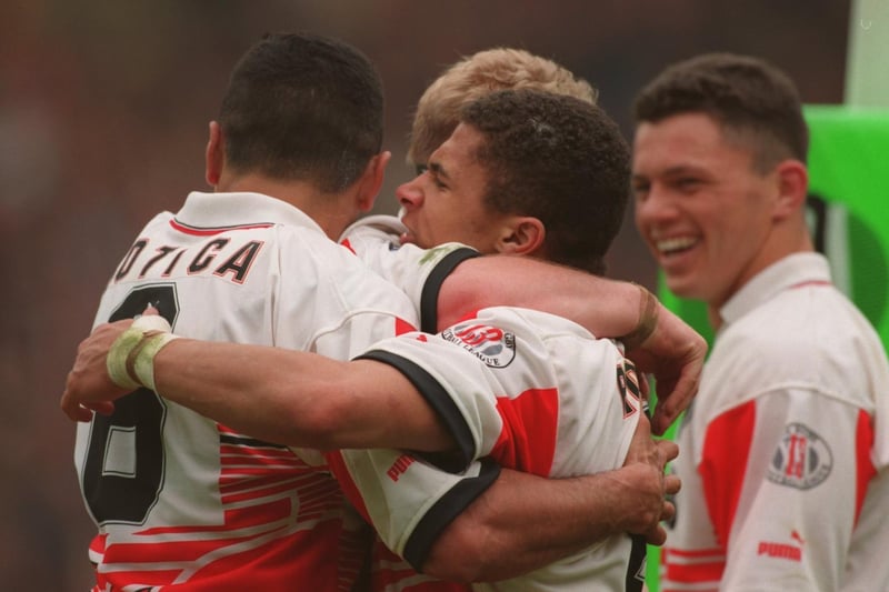 29 APR 1995 - Wigan v Leeds - Rugby League Challenge Cup Final at Wembley - Wigan's Jason Robinson is mobbed by team mates after scoring a try.  Wigan won the match 30-10.