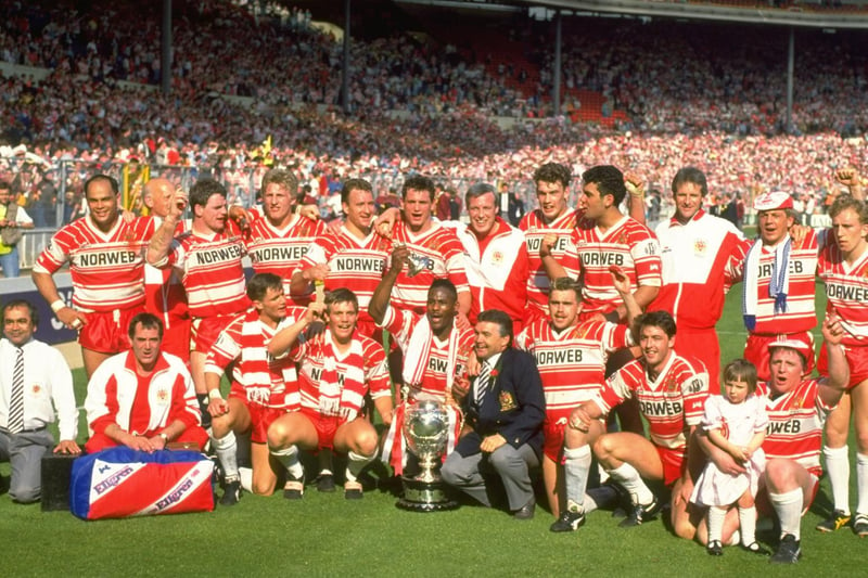 1990:  A group photograph of the Wigan Team after the Challenge Cup final against Warrington at Wembley Stadium in London. Wigan won the match 36-14.