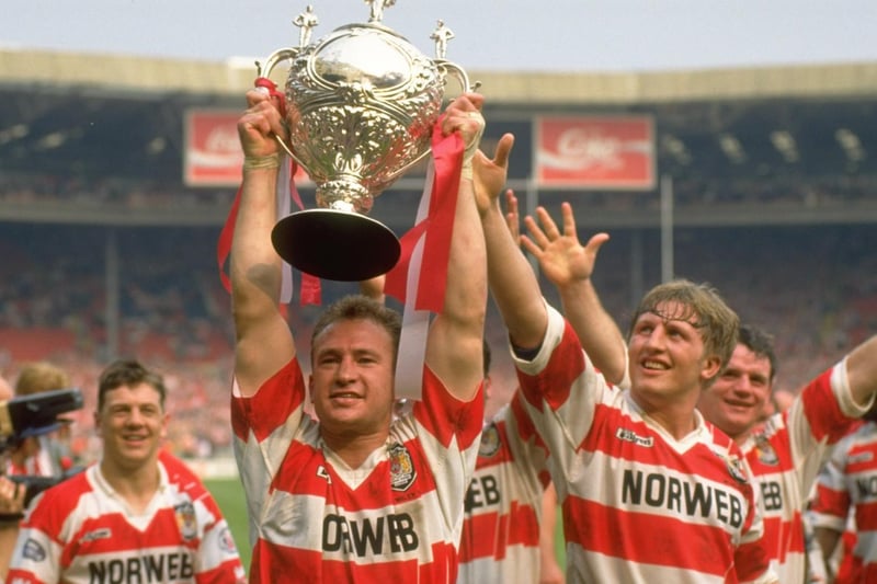 1 May 1993:  Wigan Captain Dean Bell holds the trophy aloft after the Challenge Cup final against Widnes at Wembley Stadium in London.