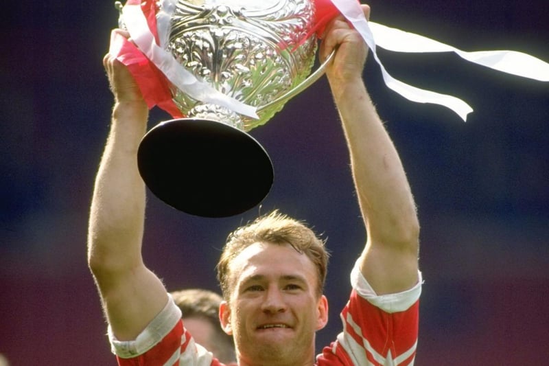 1992:  Wigan Captain Dean Bell holds the trophy aloft after the Challenge Cup final against Castleford at Wembley Stadium in London. Wigan won the match 28-12.