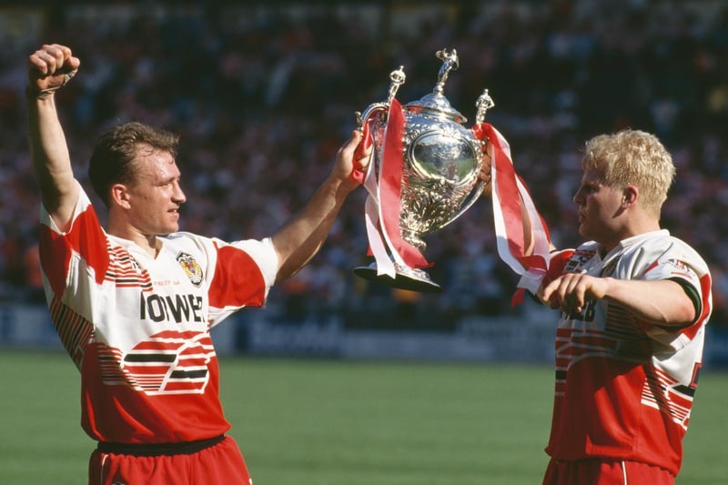 1994 - Dean Bell (left) and Mick Cassidy of Wigan with the trophy after they beat Leeds 26-16 to win the Silk Cut Challenge Cup final at Wembley Stadium.