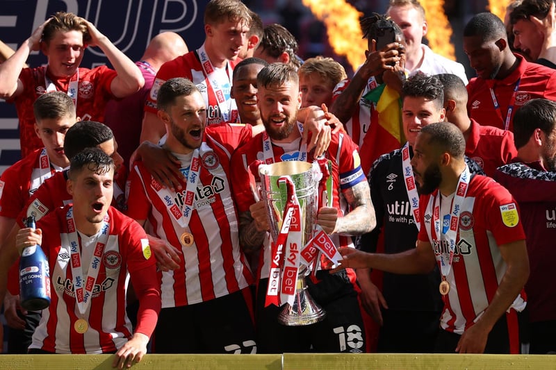 Captain Pontus Jansson and his team mates lift the trophy after winning the Sky Bet Championship Play-off Final between Brentford FC and Swansea City at Wembley Stadium on May 29, 2021 in London, England.