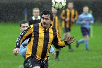 Neil Thompson of Fieldhead Hospital heads clear against Snydale Athletic in the Wakefield League Division 1 cup in December 2000