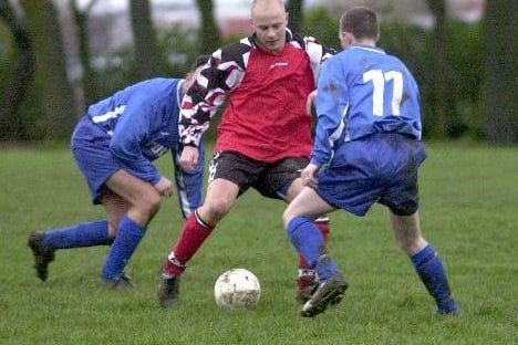 Ian Shields of Wakefield City takes on Lee Clegg of Morley Town in the County Amateur League