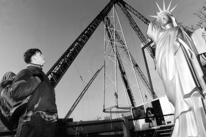 One of the star attractions of Leeds's St. Valentine's Fair in February 1994 was being put in the car park behind the Civic Hall. Workmen moved onto site to set up the 140ft high Liberty Wheel.