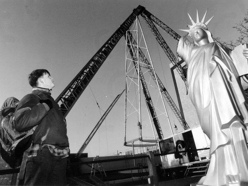 One of the star attractions of Leeds's St. Valentine's Fair in February 1994 was being put in the car park behind the Civic Hall. Workmen moved onto site to set up the 140ft high Liberty Wheel.