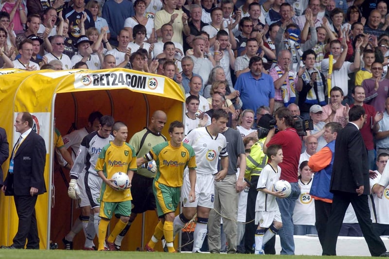 Leeds United and Norwich City heading out onto the pitch for the first match of the new season.