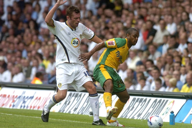 Striker Geoff Horsfield tackles Norwich City's Jurgen Colin.