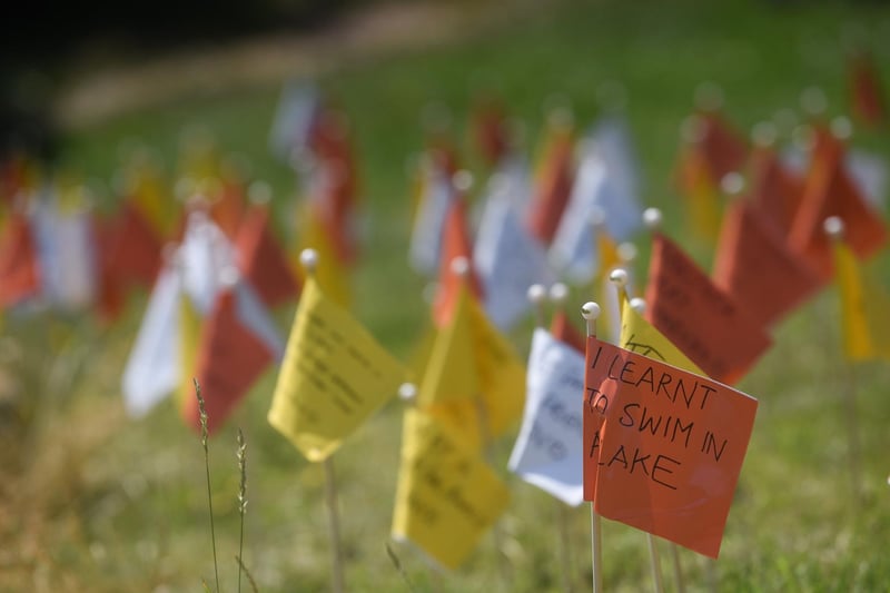 In the Flag Up installation, residents put messages on flags about things they did during lockdown.