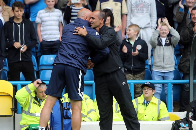Leeds United coach Uwe Rosler and Everton manager Roberto Martínez embrace before kick off.