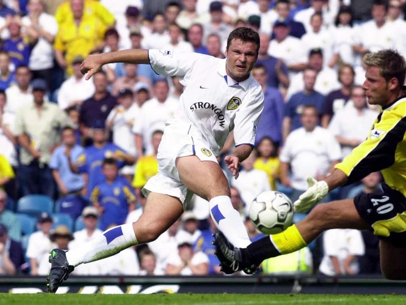 Mark Viduka fires past Manchester City goalkeeper Carlo Nash to double United's advantage.