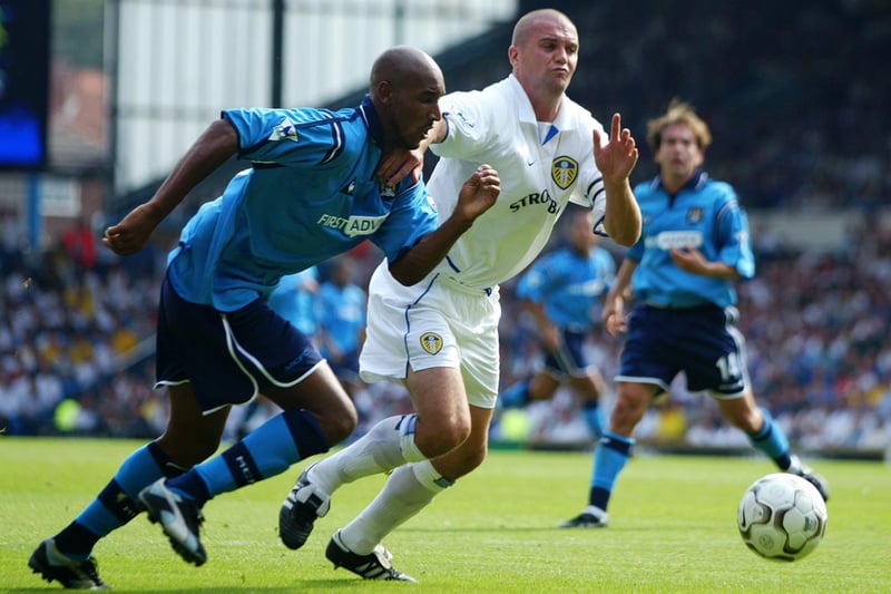 Leeds United captain Dominic Matteo battles for the ball with Manchester City striker Nicolas Anelka.