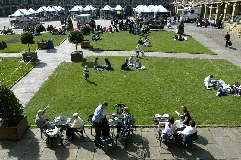 People enjoying the hot weather at the Piece Hall back in 2007.