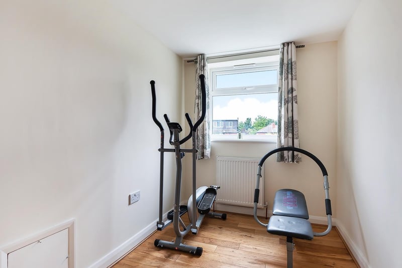 Another one of the bedrooms is currently being used as a home gym. It would fit a single bed.