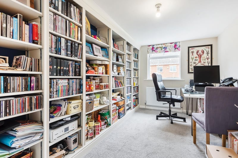 This bedroom benefits from integral shelving/library space and is currently used an office. It would fit a double/king size bed if converted back into a bedroom.