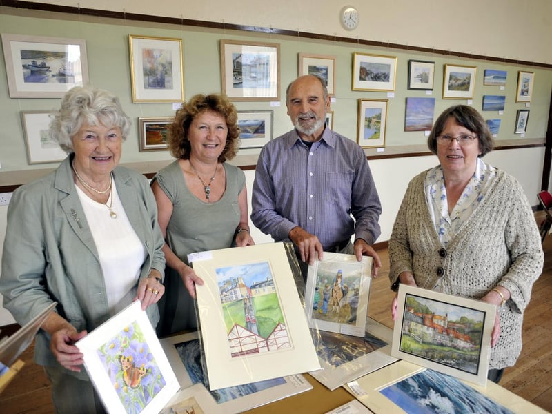 Artists and their work at the Hinderwell Gala Week Art Exhibition in the Old School.